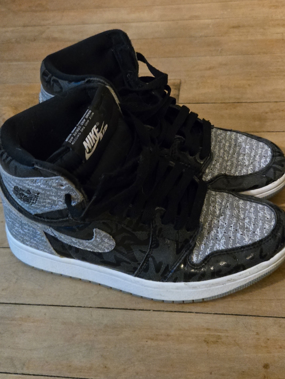 Nike Air Jordan 1 Mid in Black and Gray Script
